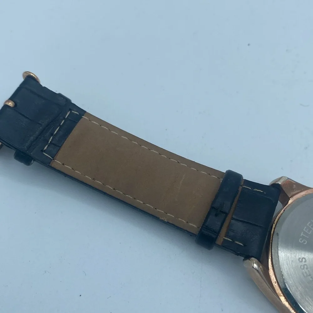 US Polo Assn rose gold tone wristwatch faux leather black band needs battery